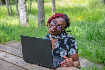 Pensive African Woman Thinking Laptop