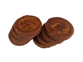 Heap of palm sugar isolated on white background, also known as red coconut sugar or coconut sap sugar. Palm sugar is a sweetener that comes from various types of palm trees.