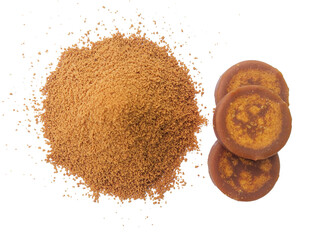 Pile of organic coconut palm sugar on white background, also known as palm sugar. Palm sugar is a sweetener that comes from various types of palm trees.