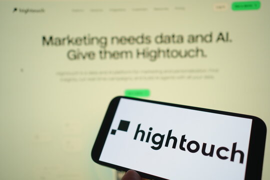Roosendaal, The Netherlands - July 27, 2025: A mobile phone displaying the logo of Hightouch, with the website in the background.