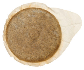 A round coffee pod or single serving of ground coffee wrapped in filter paper.