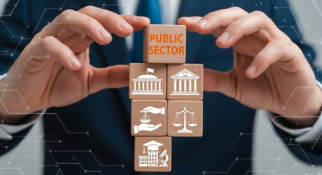 Business hands holding wooden blocks with public sector icons, representing government services and institutions.