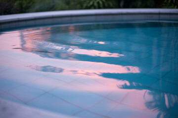Rippled Pool Water Reflecting a Pink and Blue Sky at Dusk