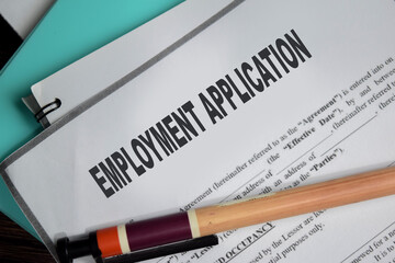 Concept of Employment application form write on document isolated on Wooden Table.