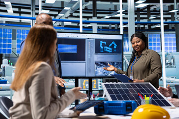 Photovoltaics factory manager meets with shareholders to present business operations data and...