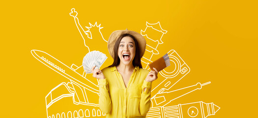 A joyful traveler displays her tickets and passport, smiling broadly with a summer hat. An...