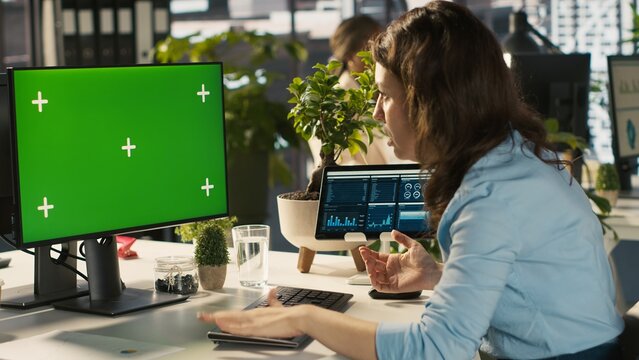 Employee at work having trouble with broken keyboard while using isolated screen PC. Office clerk in workplace unable to continue work on mockup PC because of defective computer peripherals, camera A