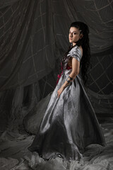 Young woman in authentic Arabian costume, detailed oriental attire for themed event
