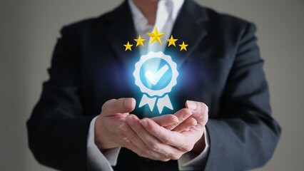 Businessman shows the sign of the top service Quality assurance 5 star, Guarantee, Standards, ISO certification and standardization concept.