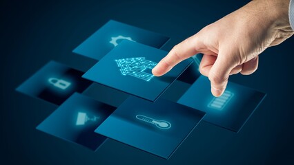 Person touching   holographic interface showing various app icons, representing digital connectivity and technology.