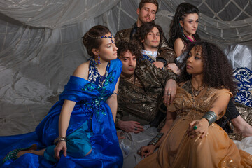 Middle Eastern fantasy concept with models in elaborate Turkish attire, storybook composition.
