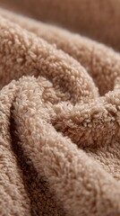 Close-up of Soft Beige Fluffy Towel Texture, Cozy and Luxurious Fabric