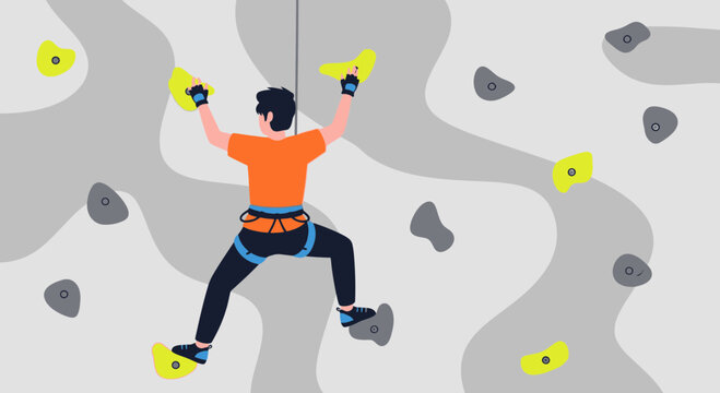 Man Climbing On An Indoor Climbing Wall Demonstrates Strength And Agility