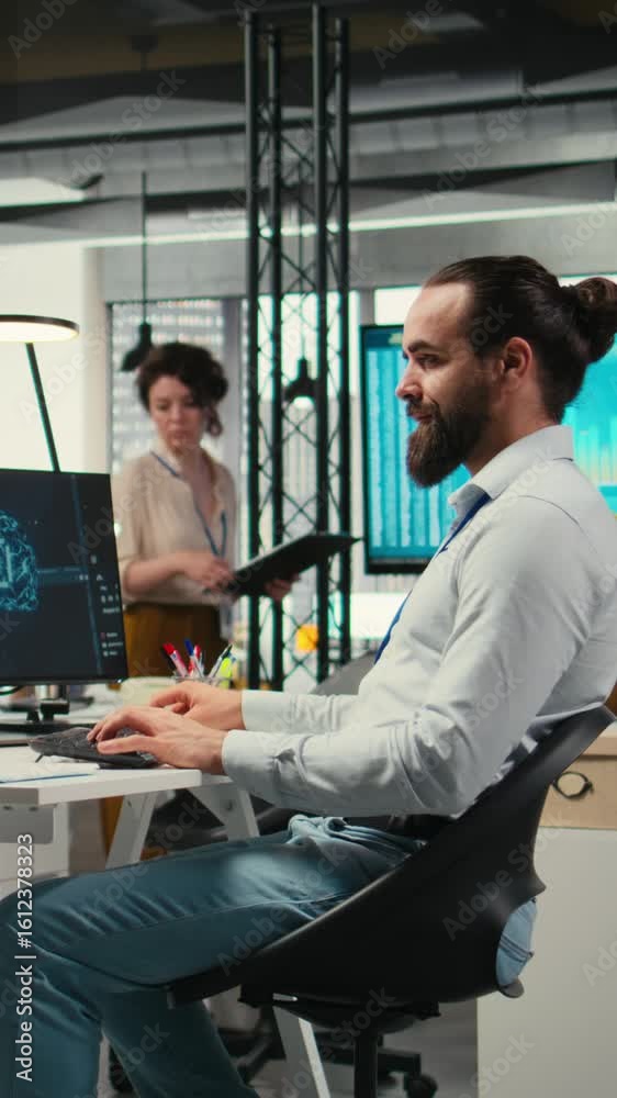 Poster vertical video it specialist uses ai neural networks for data sharing and digitalization, working in