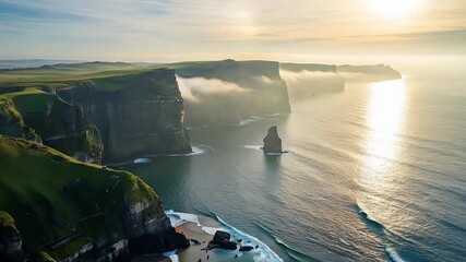 Aerial drone bird's eye view video of Majestic Cliffs of Moher, Ireland. A Sunrise Panorama. Cinematic Aerial View Morning Fog Landscape in 4K - Powered by Adobe