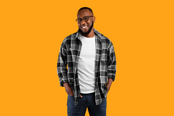 Self-Confidence. Successful Black Millennial Man Wearing Eyeglasses And Checked Shirt Posing With...