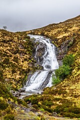 Obraz premium Eas a' Bhradain Waterfall, Blackhills Waterfall, Loch Ainort, A87 road, Isle of Skye, Scotland, England 