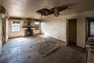 The broken and damaged interior of an abandoned home in the city of Spokane, Washington.