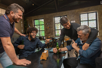 Friends Laughing and Chatting at Bar – Good Times Together