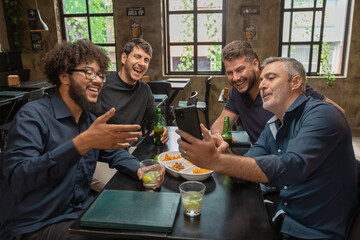 Group of Friends Taking Selfie at Bar – Fun and Friendship Moments