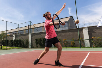 Tennis Player Hitting Forehand Shot – Action and Power in Sport