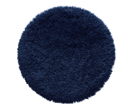 A deep indigo circular rug. Dense, fuzzy texture