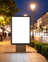 Blank billboard at night in city street