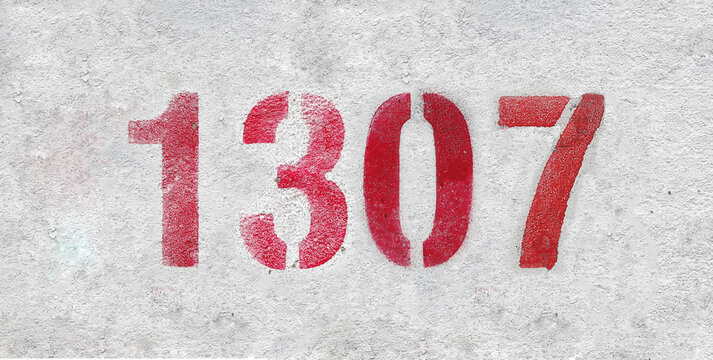 red spray-painted number 1307 sprayed onto a white wall.