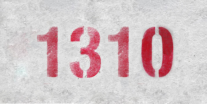 red spray-painted number 1310 sprayed onto a white wall.