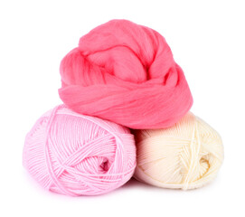Felting wool and knitting yarn isolated on white