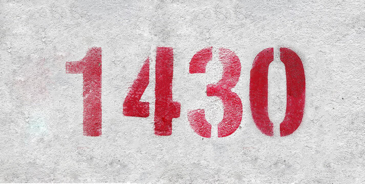 red spray-painted number 1430 sprayed onto a white wall.