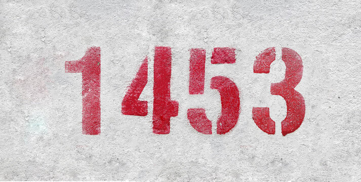 number 1453 . Red spray paint the white wall