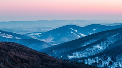 Naklejka premium Mountain landscape bathed in twilight hues of deep blue and fading sunset colors. 