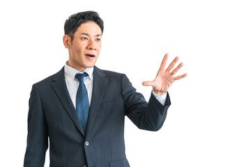 手のひらを拡げるスーツ姿の中年アジア人ビジネスマン（拒否・驚く・注意・びっくり・ダメ・止める）
