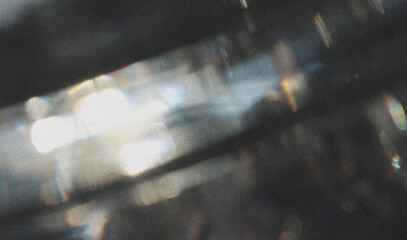 prism light leak texture for photo overlay and effect lens flare in abstract background bokeh effect with glow and magical lights on black background