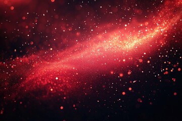 Fototapeta premium Vibrant swirling red particles and light specks against a dark background creating a cosmic or magical energetic atmosphere