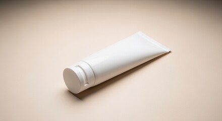 A pristine white tube of skincare cream rests elegantly on a neutral beige background, ready for use.