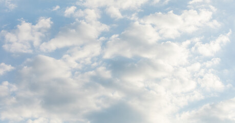 Soft Cloud Layers Floating Beneath a Blue Sky
