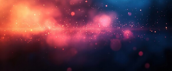 Close-up of glowing bright particles suspended in air against a dark background with warm orange and cool blue hues creating a dreamy and magical atmosphere