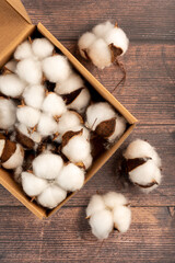 Artificial cotton in eco-friendly craft packaging, ideal for fall decorations and handmade crafts. Adds a touch of warmth and comfort