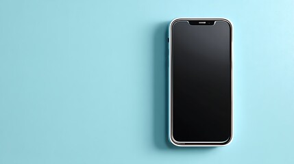 A sleek smartphone with a black screen lies on a light blue surface