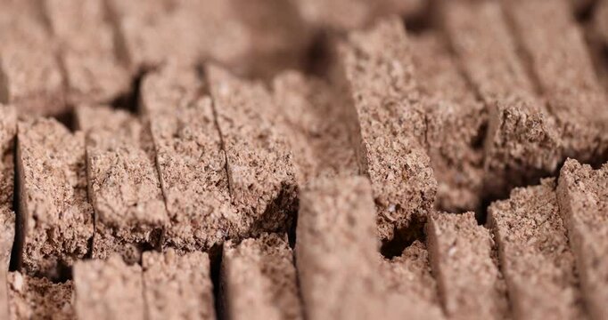 broken cork wood panel, for industry and household needs, is a natural soft and durable material that is obtained from the bark of a cork tree closeup