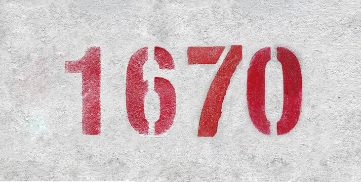 red spray-painted number 1670 sprayed onto a white wall.