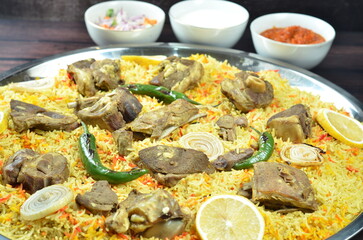 Nasi Kebuli, Indonesian variation of pilaf with Arabic rice influence, cook with goat, lamb or chicken, Spiced  with Clove, Cinnamon and garlic.