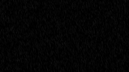 Dramatic rainfall against a black background. An abstract and moody texture of a stormy night, perfect as an overlay or backdrop.