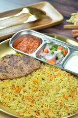 Nasi Kebuli, Indonesian variation of pilaf with Arabic rice influence, cook with goat, lamb or chicken, Spiced  with Clove, Cinnamon and garlic.