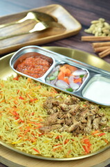 Nasi Kebuli, Indonesian variation of pilaf with Arabic rice influence, cook with goat, lamb or chicken, Spiced  with Clove, Cinnamon and garlic.