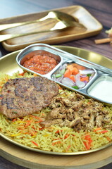 Nasi Kebuli, Indonesian variation of pilaf with Arabic rice influence, cook with goat, lamb or chicken, Spiced  with Clove, Cinnamon and garlic.