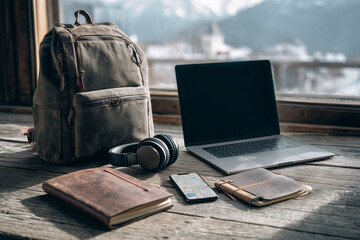 A photograph of travel gear and tech devices