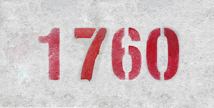 red spray-painted number 1760 sprayed onto a white wall.